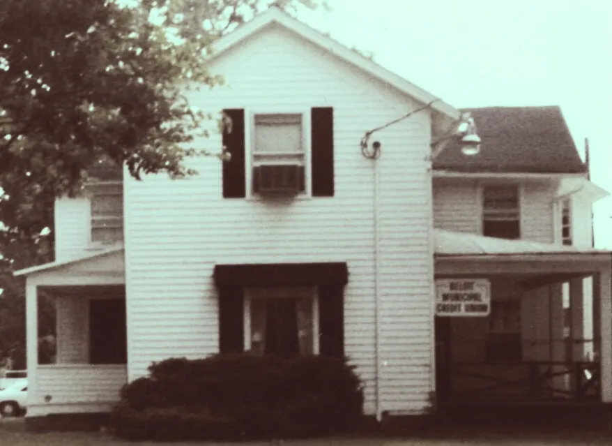 Black and white photo of an office building saying Beloit Municipal Credit Union on it