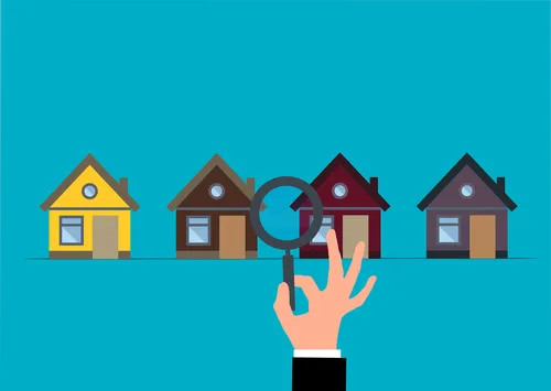 Clipart of four houses being examined by a hand holding a magnifying glass